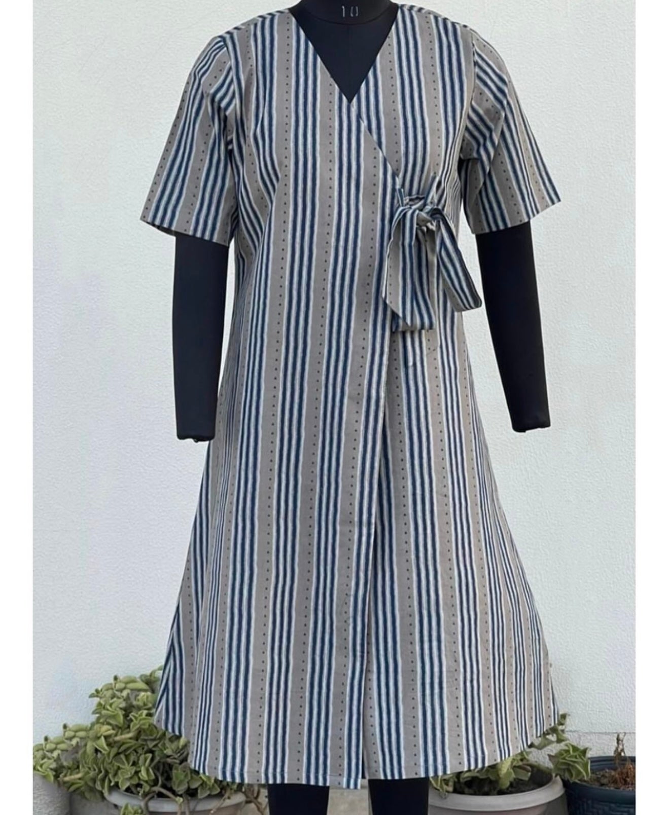 FLARED WRAP ON DRESS WITH ROUND HEM