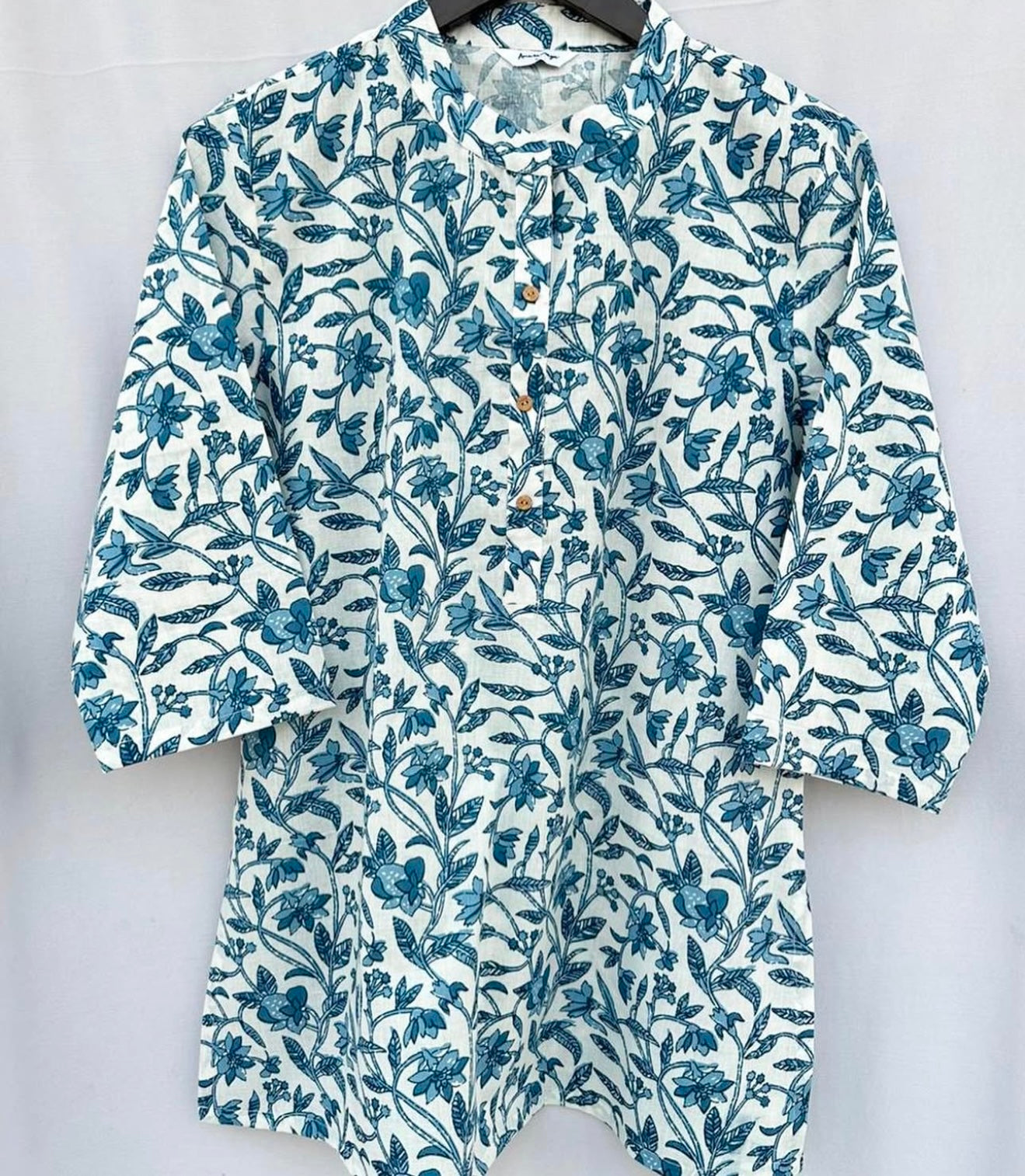 SHORT KURTA WITH BAND COLLAR AND BUTTON DETAILS