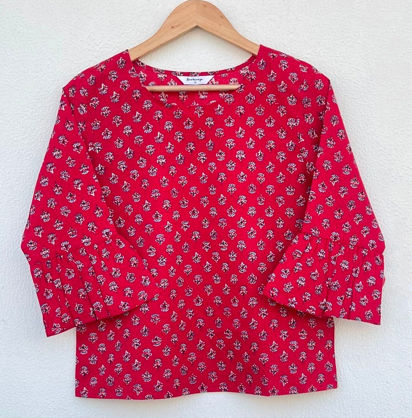 FLOWY ROUND NECK TOP WITH FRILLED SLEEVES