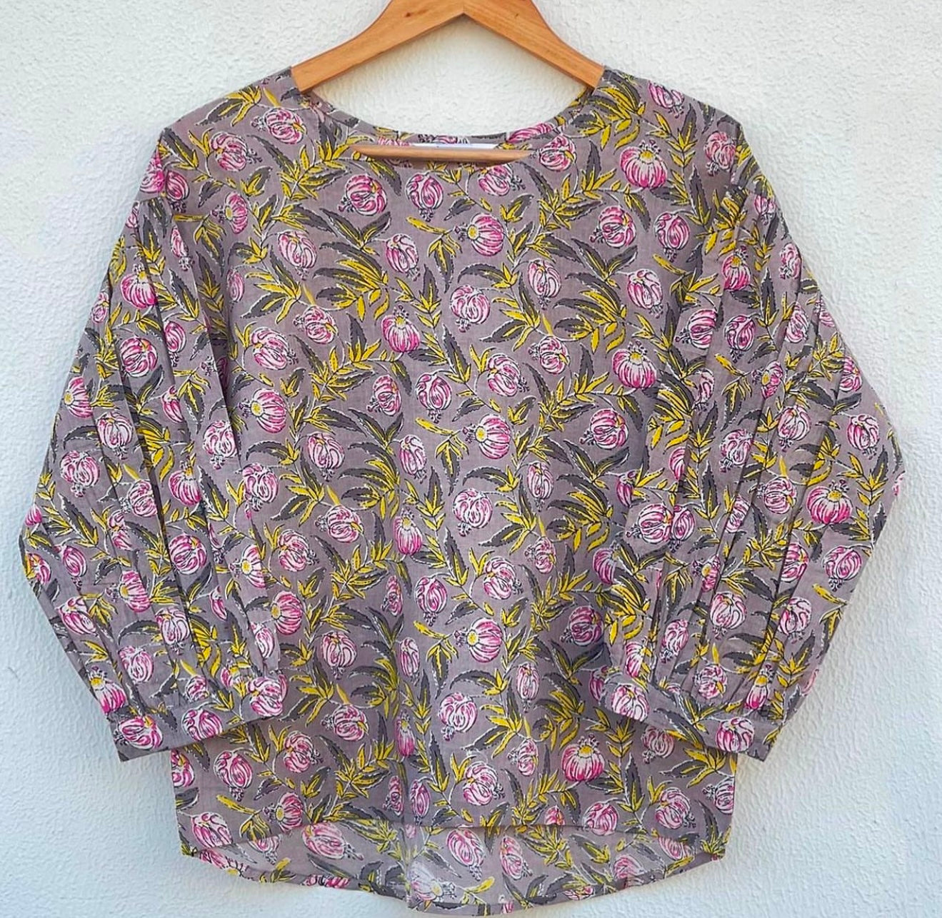 ASYMMETRICAL PUFFED SLEEVES TOP