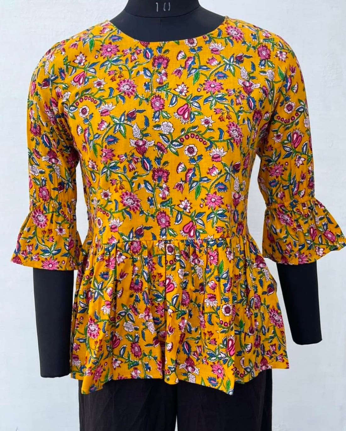 PEPLUM TOP