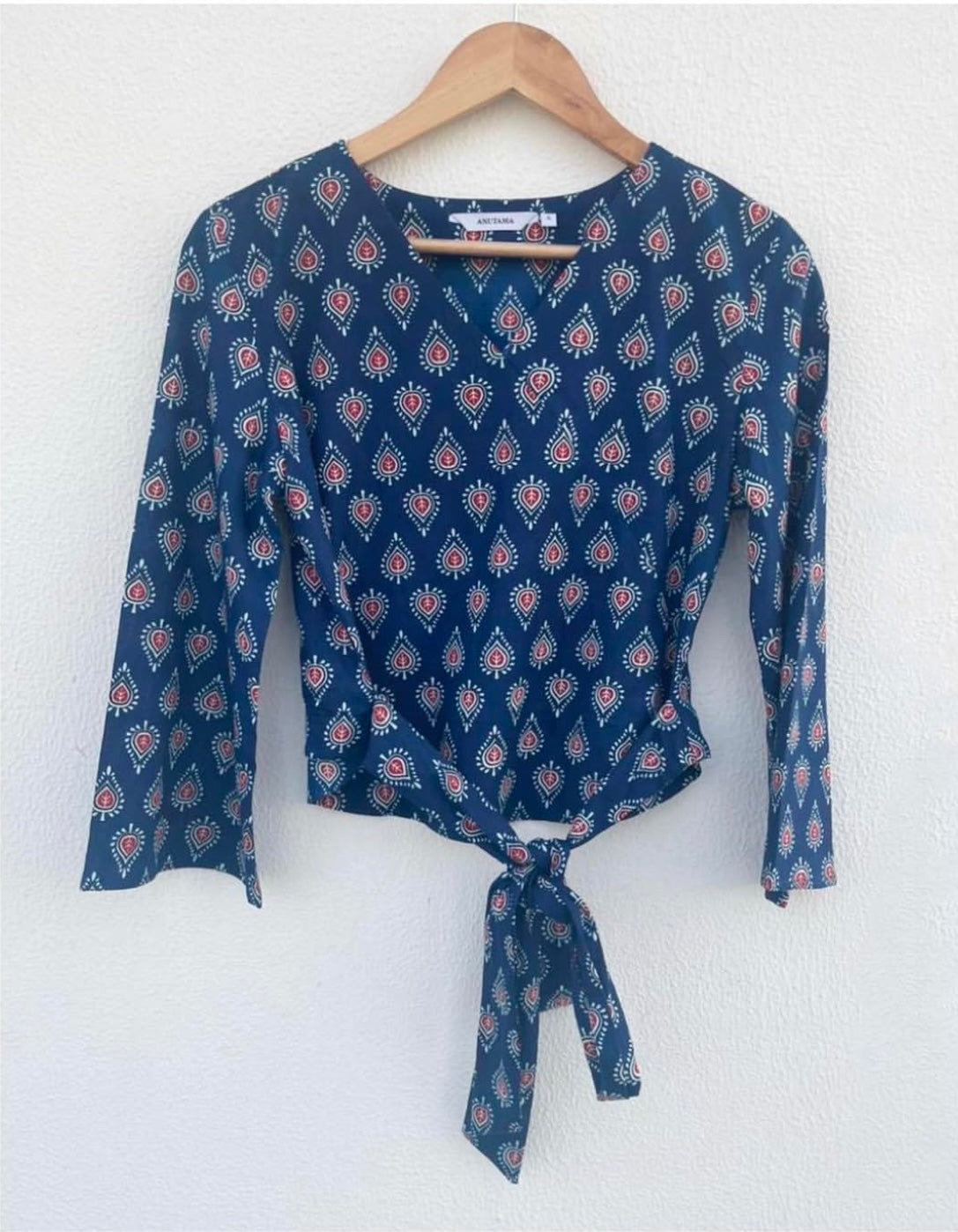 WAIST TIE TOP WITH BELL SLEEVES