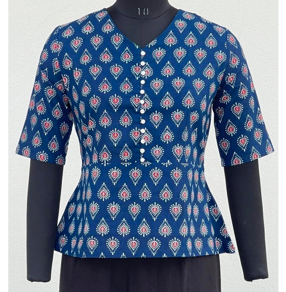 V-NECK PEPLUM TOP