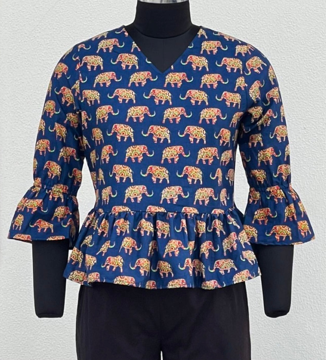 PEPLUM BLOUSE