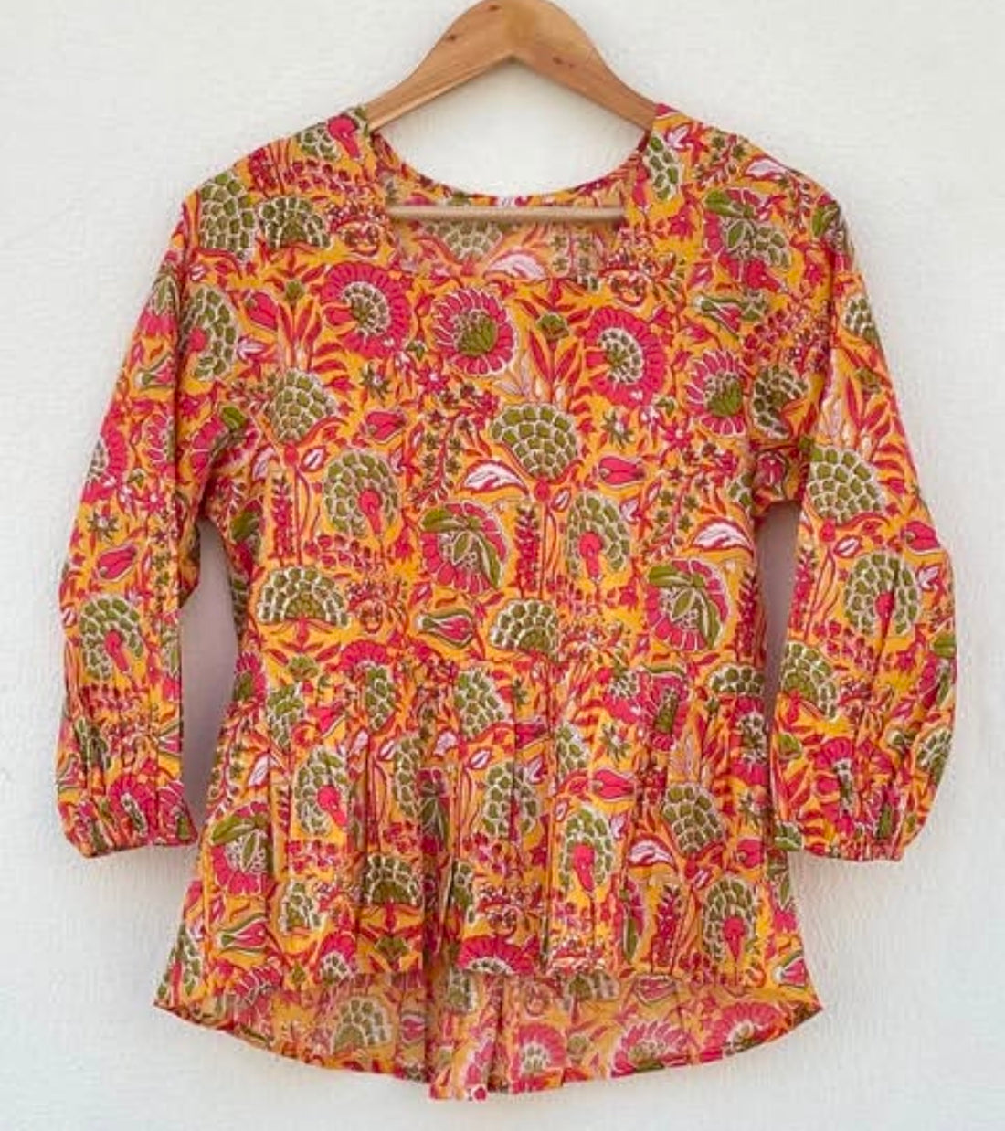 BASIC PEPLUM TOP WITH PUFFED SLEEVES