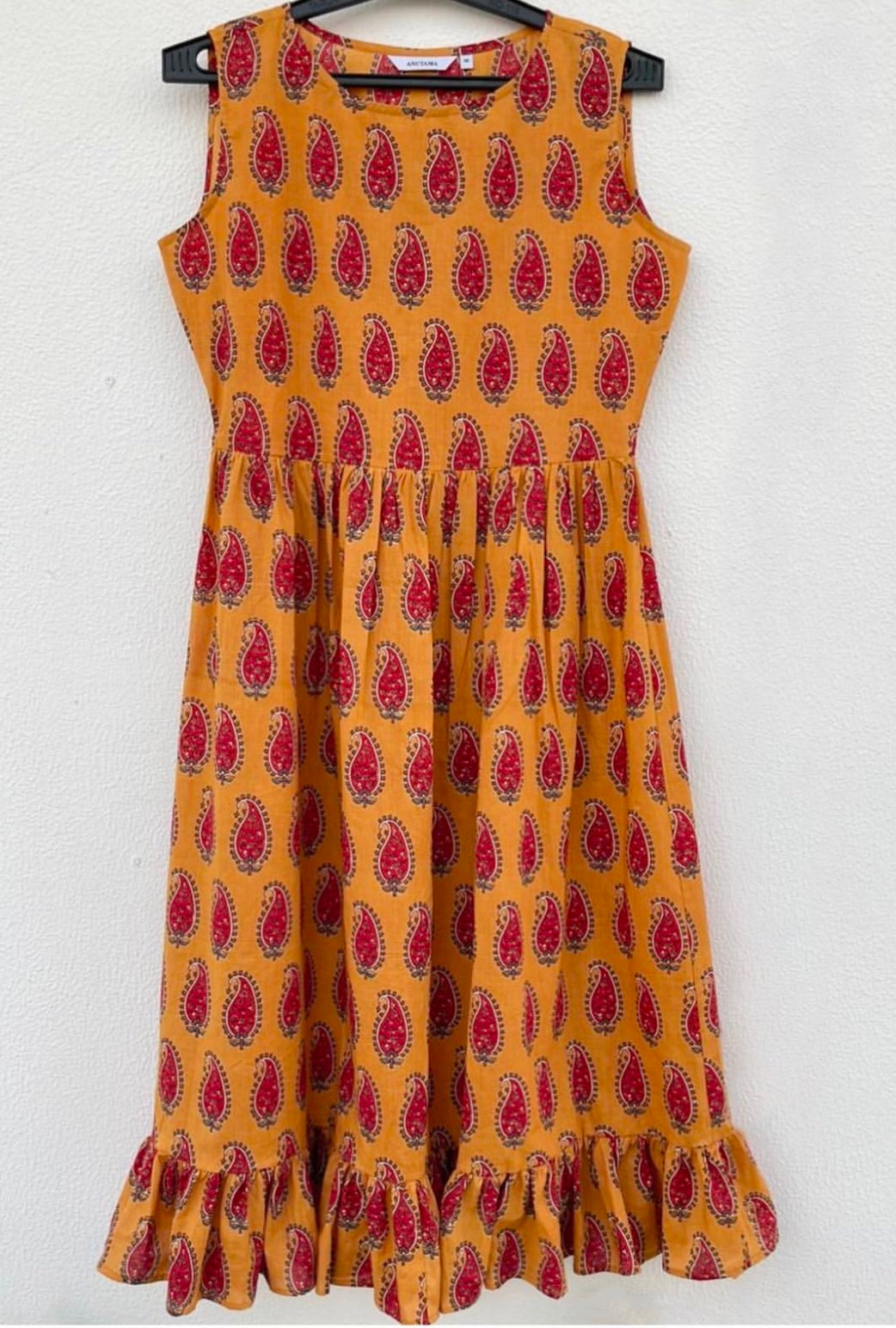 SLEEVELESS LONG DRESS WITH FRILLED BOTTOM
