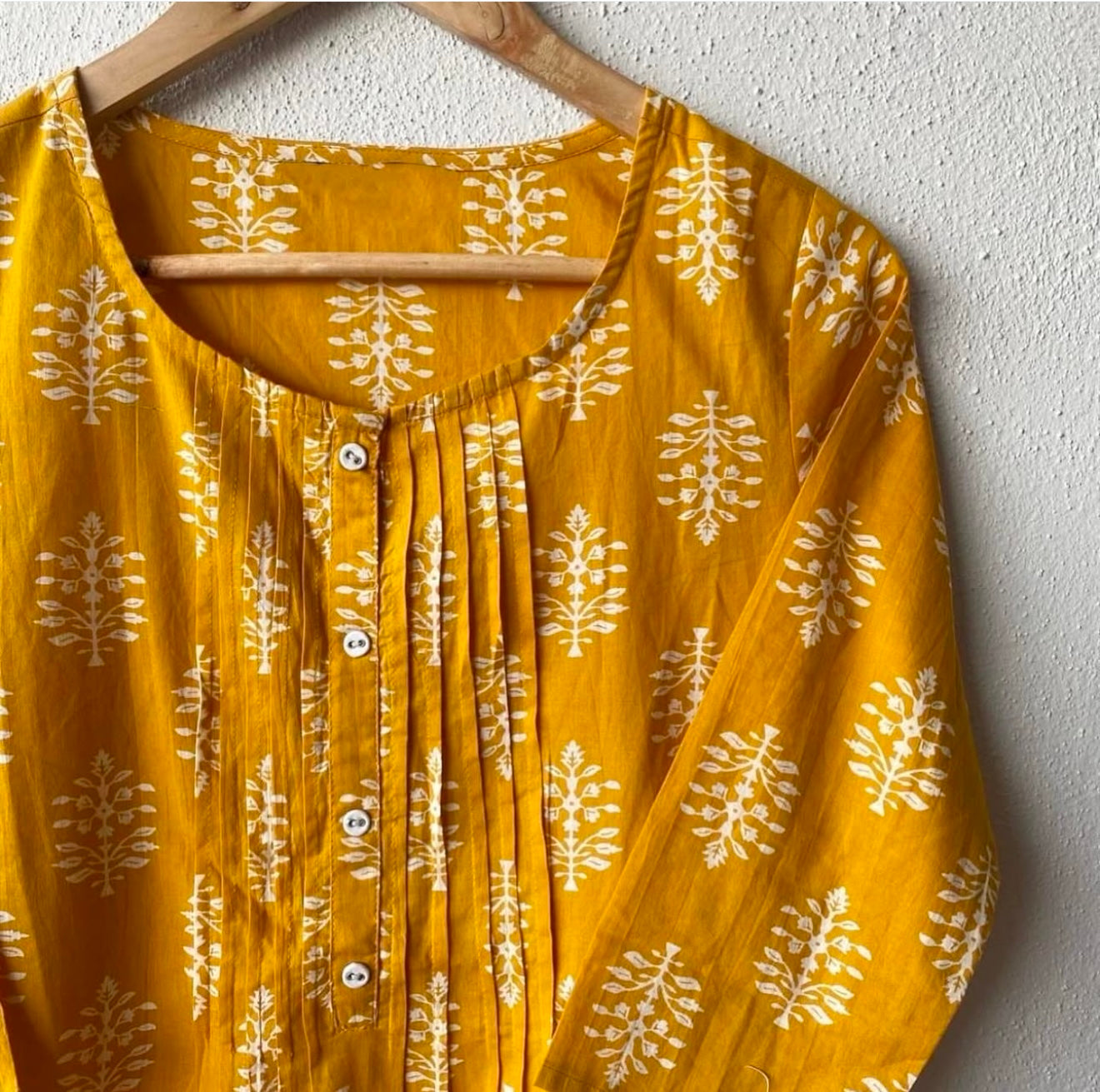 PLEATED ROUND NECK KURTA WITH BUTTON DETAILS