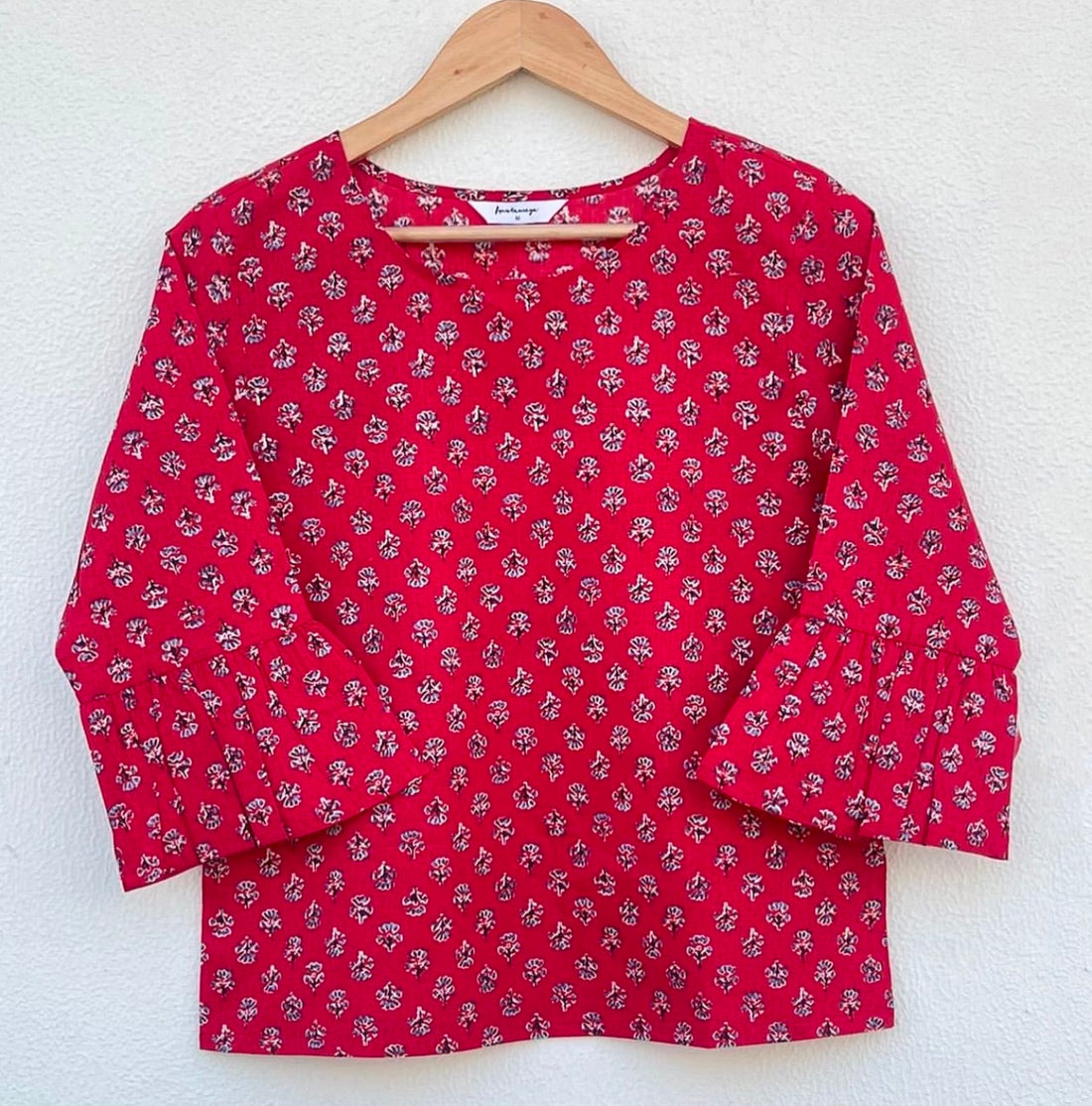 FLOWY ROUND NECK TOP WITH FRILLED SLEEVES