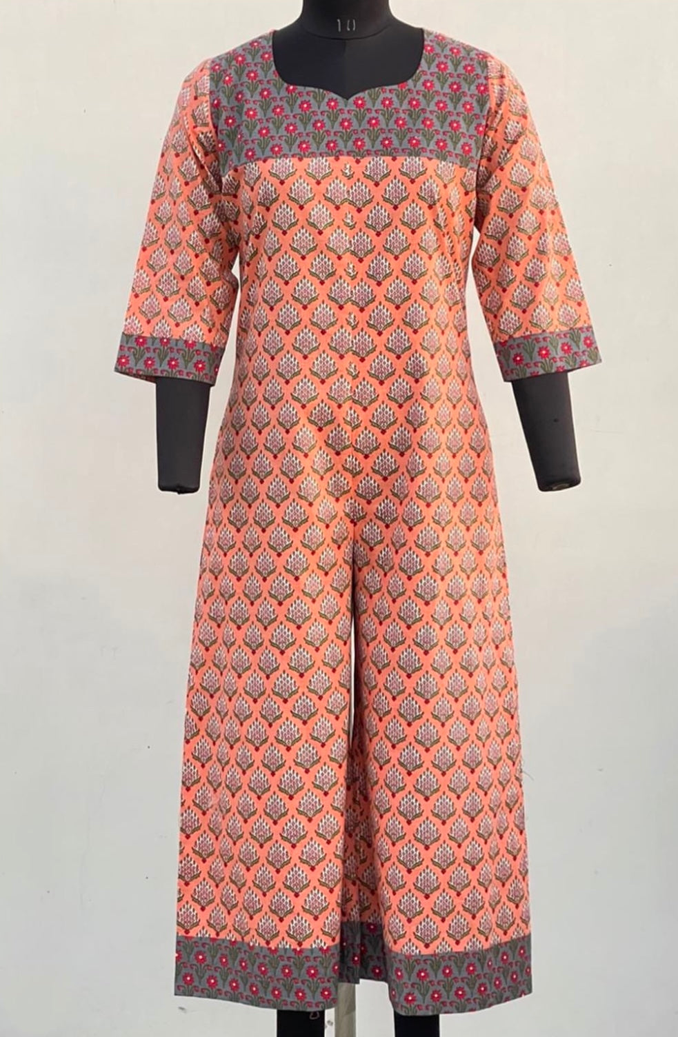 CONTRASTED JUMPSUIT WITH FRONT ZIP PANEL
