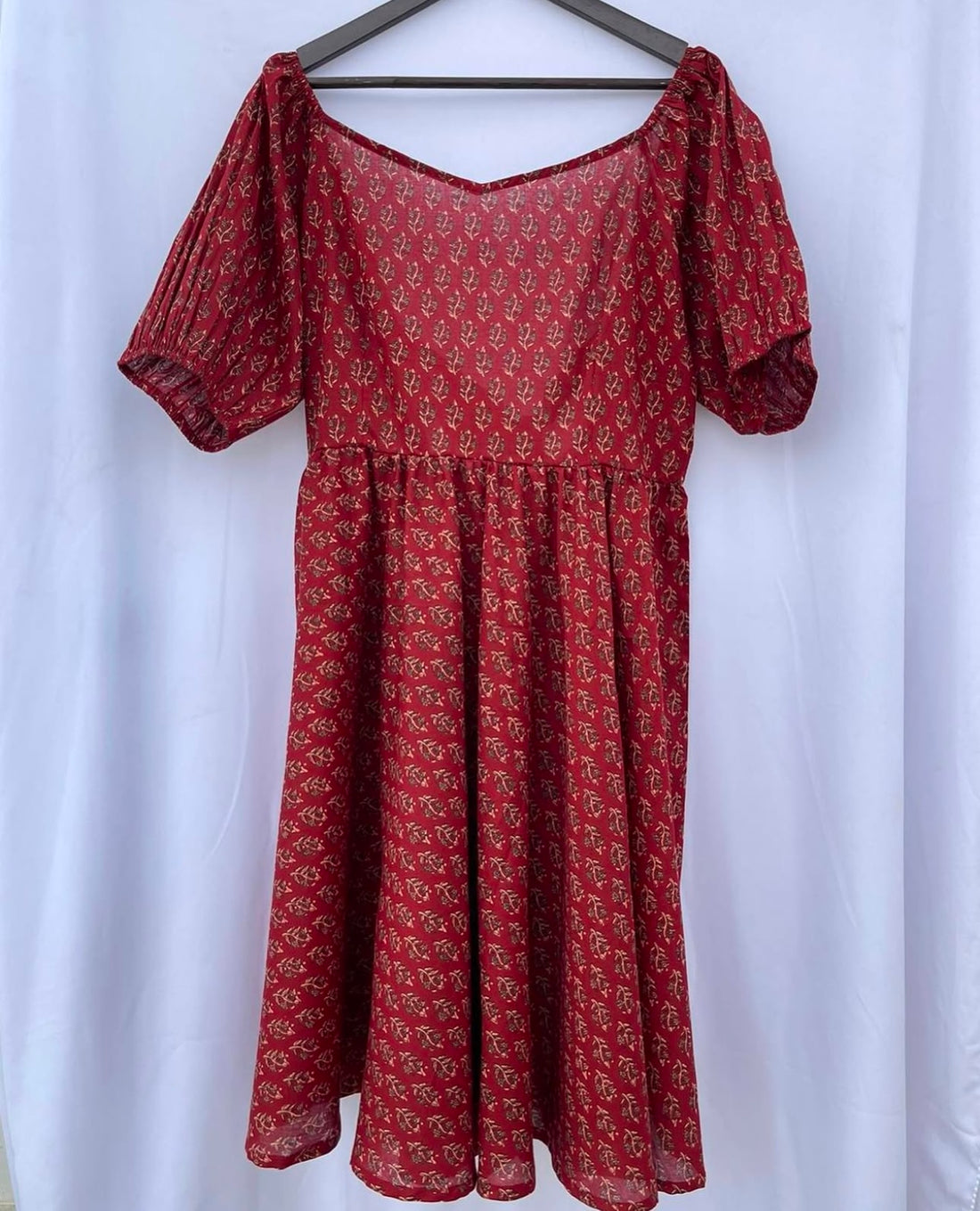 BACK KNOT STYLED FLARED MIDI DRESS