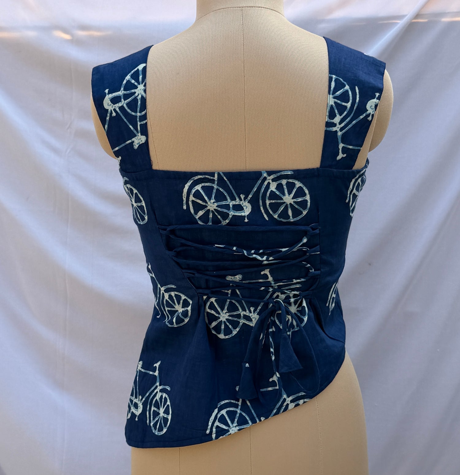 ASYMMETRICAL TOP WITH BACK STYLED