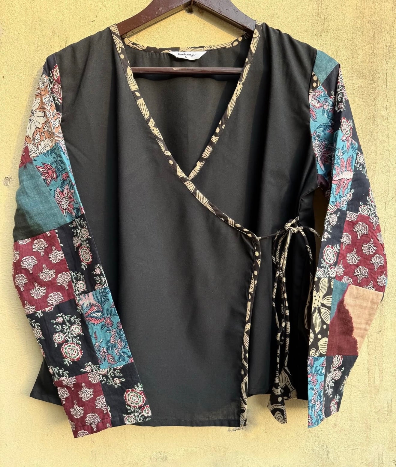 PATCHED SLEEVES WRAP ON TOP